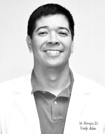 A photo of a smiling Dr. Kirk A. Munsayac